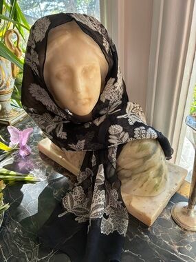 Embroidered silver on black scarf